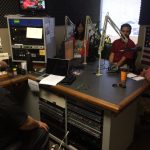 View of the radio studio with host Rick Hamada